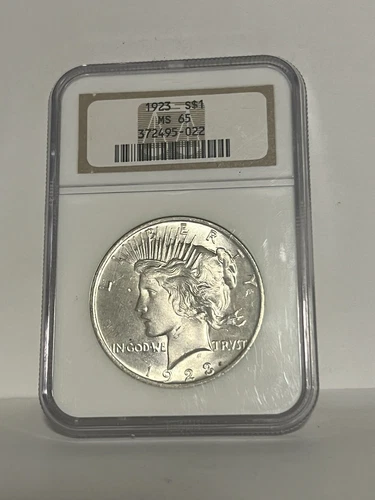 1923  $1 PEACE SILVER DOLLAR -- NGC MS65