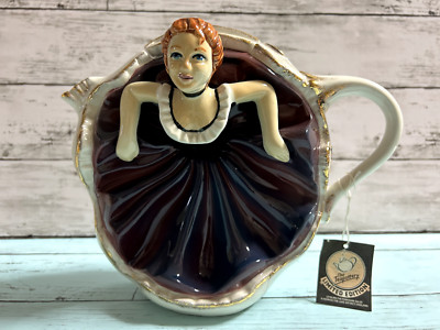 The TEAPOTTERY Tea Pot Limited dancer collectible serial number with tag