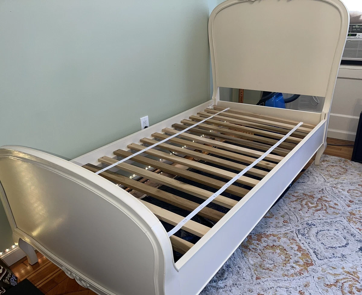 White Pottery Barn Princess twin bed frame with solid wooden slat