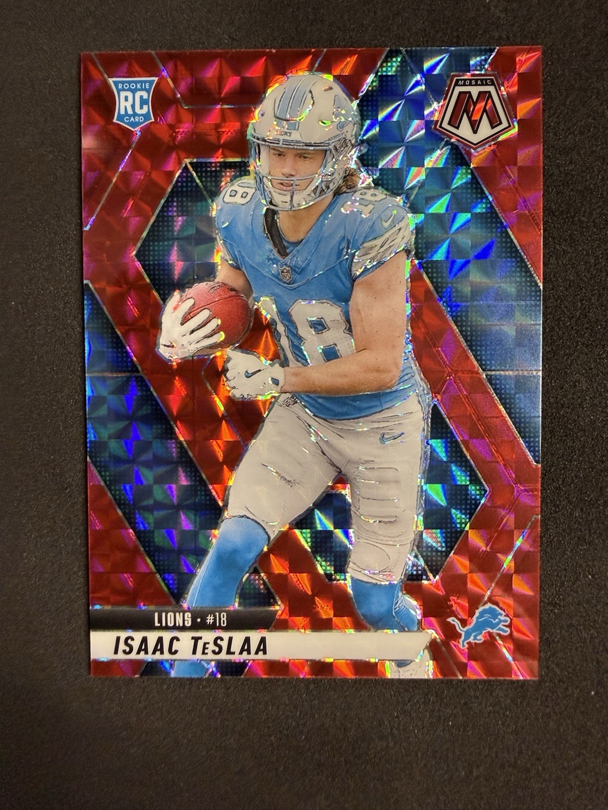 2025 Panini Mosaic Isaac Teslaa #319 RC Rookie Red Prizm Detroit Lions (B)