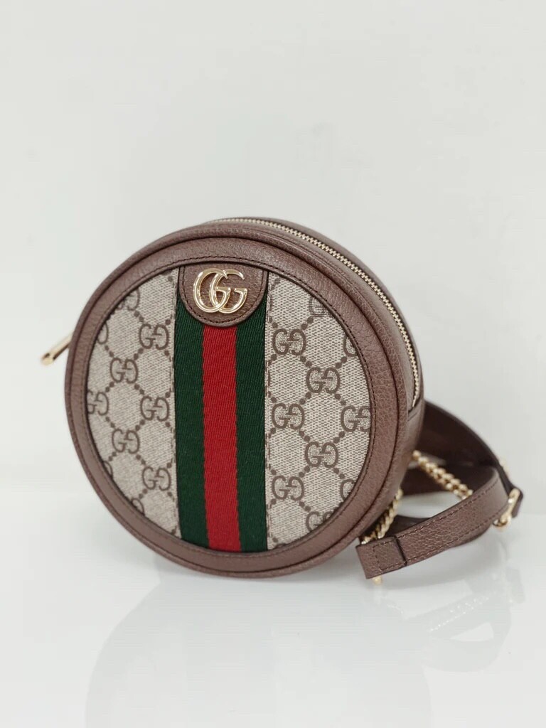 gucci mini round backpack GG Ophidia Supreme GG Addicted to Handbags Gucci expands the GG Marmont family with this compact backpack Gucci Mini Canvas Ophidia Backpack