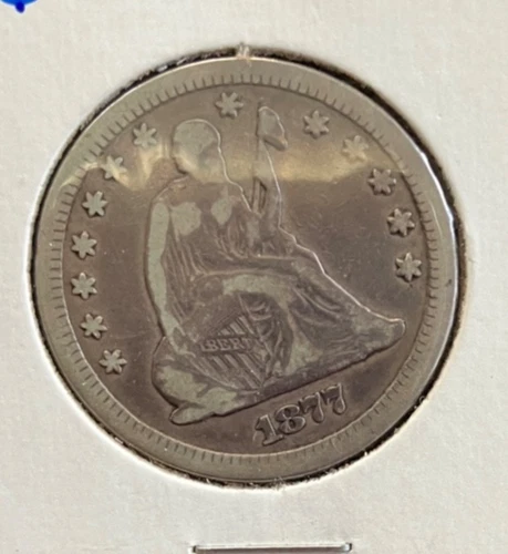 1877-CC Seated Liberty Quarter VG / F Condition