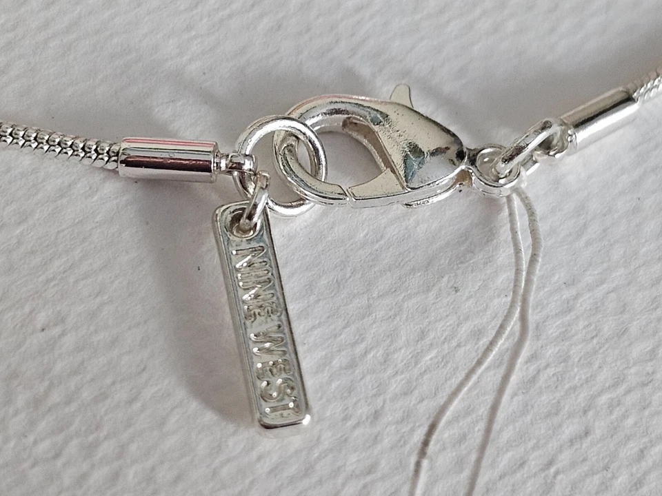 Moderno collar de cadena en tono plata con grandes eslabones circulares Foto 4 de 4