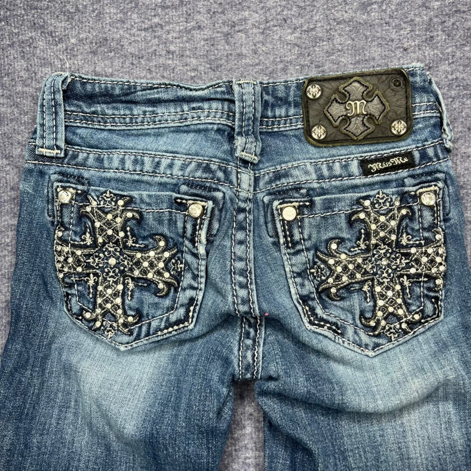 Pantalones de mezclilla ajustados Miss Me para niñas con diamantes de imitación adornados con bolsillos cruzados azules talla 7 Foto 4 de 4