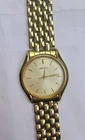 Mens Seiko V701-7A20 Gold Tone Stainless Steel Quartz Wrist Watch