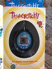 Vintage Bandai Tamagotchi virtual pet 1800 - blue/silver - new in packaging