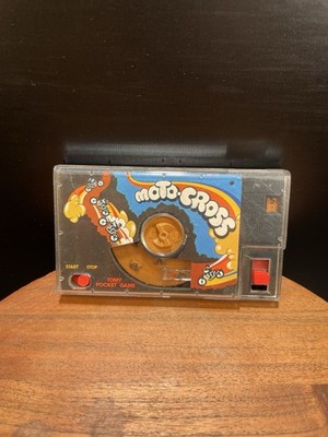 Vintage 1987 Tomy Pocketfuls Moto-Cross Pocket Game Handheld Toy