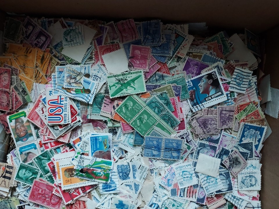 4 pounds of U.S. older stamps off paper large flat rate box approx