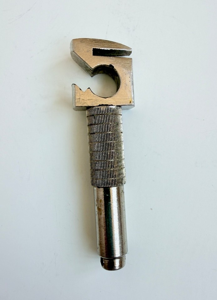 A genuine USSR-era pocket corkscrew — a tiny Cold War artifact that actually opens your wine.