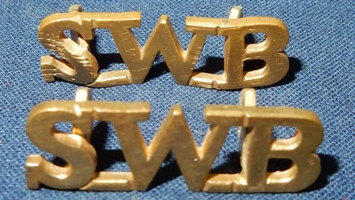 GENUINE WW1 ERA SWB SOUTH WALES BORDERERS REGIMENT SHOULDER TITLE BADGE PAIR