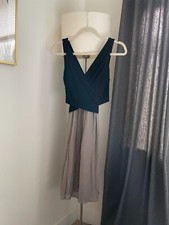 Anthropologie "Amadi" black and gold V-neck knee length dress - S