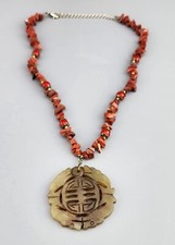 Caved Jade pendant with Red rock Beads