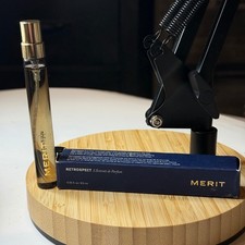 MERIT   Retrospect   L'extrait Eau de Parfum Purse Spray Perfume 0.32 oz 9.5 ml