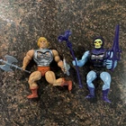 1984 Vintage MASTERS OF THE UNIVERSE Battle Armor He-Man And Skeletor w/ Weapons