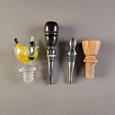 Lot of 4 Bottle Stoppers,  Cork, Metal And Plastic decorative