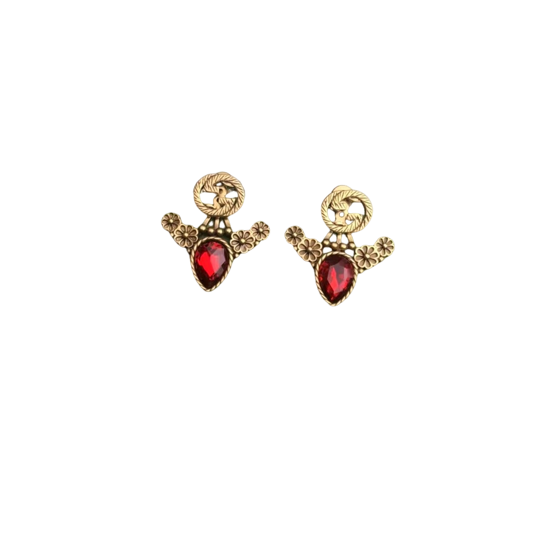 Exquisite earrings: Ruby embellished flower earrings, fashionable focus, trendy
