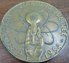 LIGHT'S DIAMOND JUBILEE 1879-1954 BRASS TOKEN THOMAS EDISON INVENTION LAMP 1879