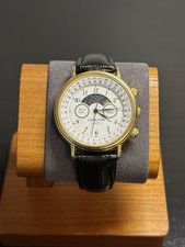 Vintage Carlton Quartz 37mm watch features a gold-tone case, Moon Phase!