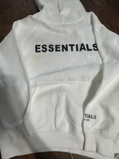 white essentials hoodie