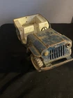 Toy, vintage pressed steel Tonka Jeep, likely from the 1960s