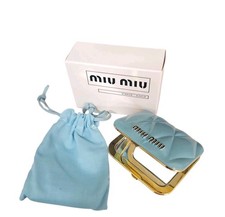 Luxury Miu Miu brand compact mirror for women and girls in turquoise.