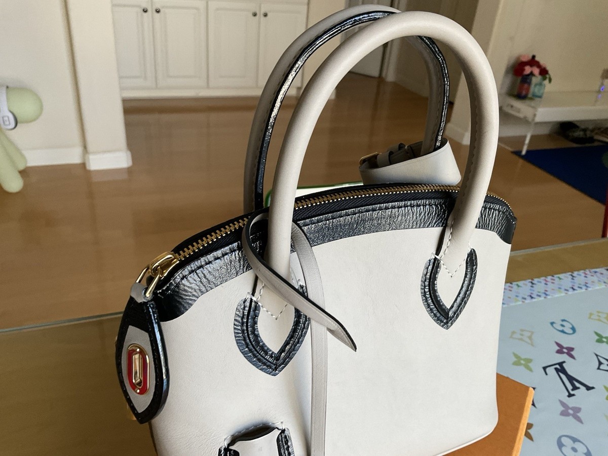 LOUIS VUITTON LIMITED EDITION (AUTOMNE -HIVER 2011-2012)LEATHER