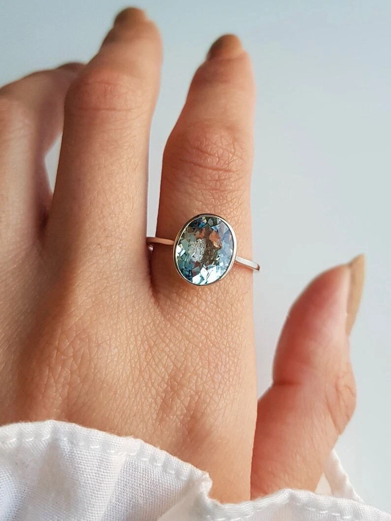 Solitaire aquamarine deals ring