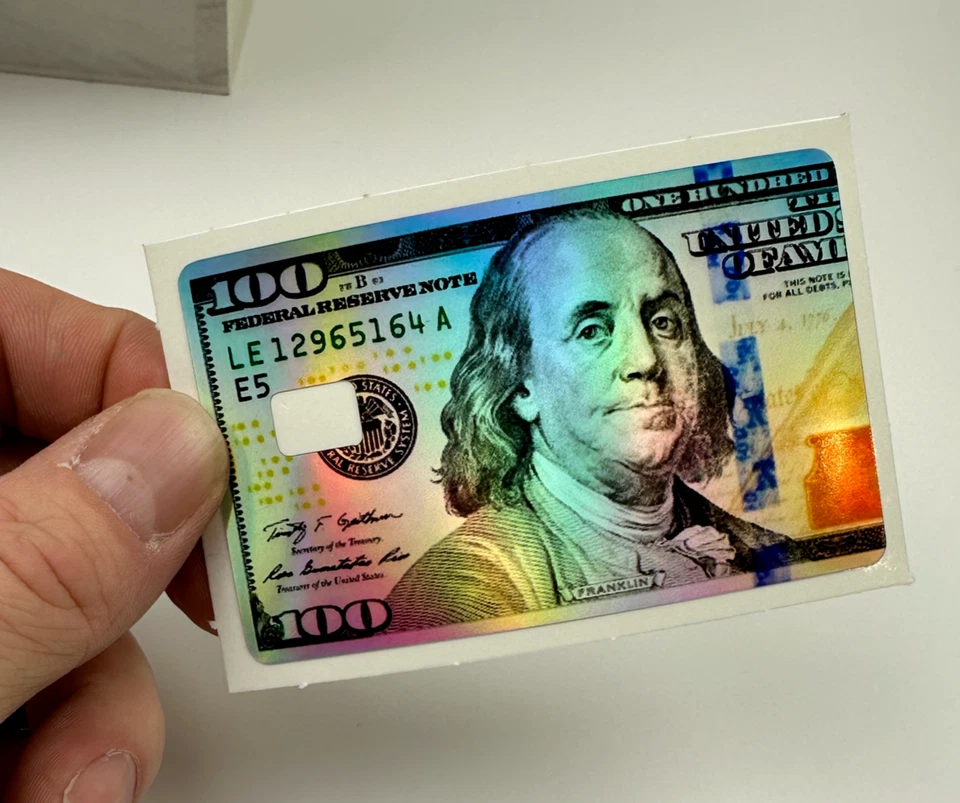 Calcomanía holográfica para billetes de cien dólares con pieles de tarjetas de crédito Foto 2 de 4