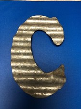 Corrugate 5    metal letters C, H, O, T, T with back hooks. 11/per letter