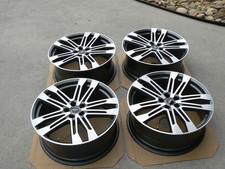A set of factory Audi Sport 21" 5-Double-Spoke-V Design Wheels