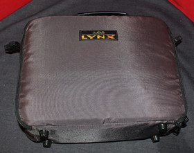 Atari Lynx W. Game Cartridges, and  Carrying Case and power adapter AO4079462