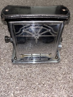 antique Universal Turn Easy Electric Toaster