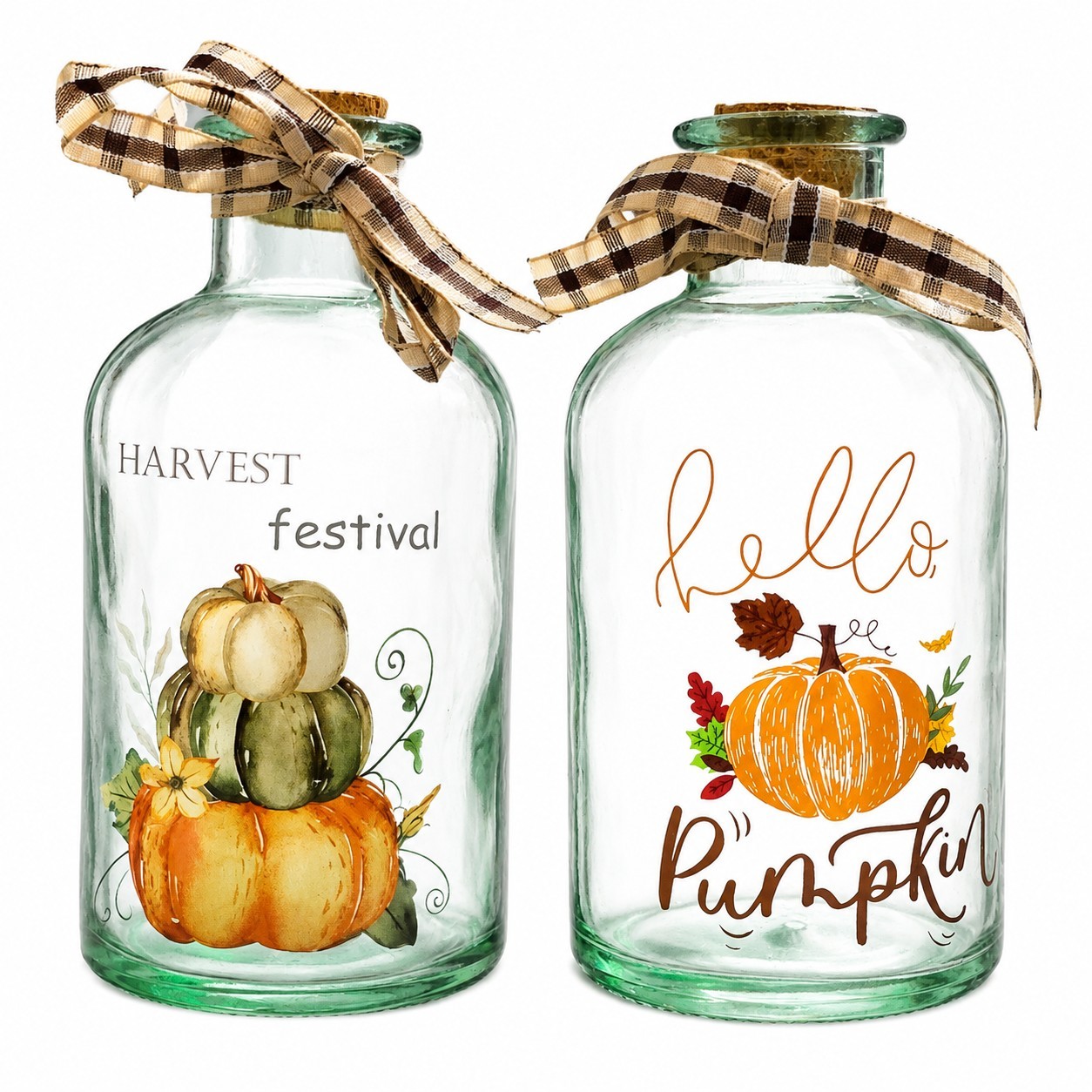Two glass bottles shaped like pumpkins with cork stoppers.