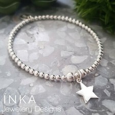 Inka Sterling Silver 925 Stretch beaded bracelet with a Star charm