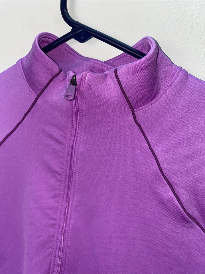 Jersey de media cremallera Underarmor para niñas usado talla L Foto 3 de 4