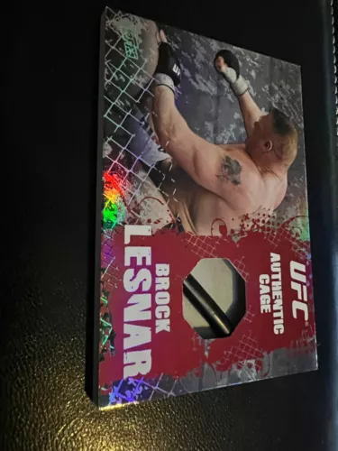 2010 UFC Topps Main Event Brock Lesnar Cage Relic Authentic Octagon Piece