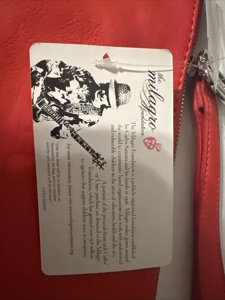 monedero carlos santana Foto 3 de 4