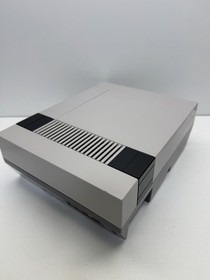 Nintendo NES Action Set Console Tested Working 2 controllers 1 gun