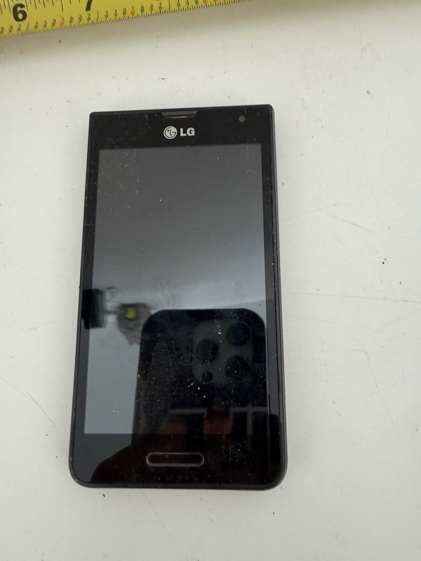 LG Cell PHONE UNTESTED FOR PARTS OR PROP ONLY 