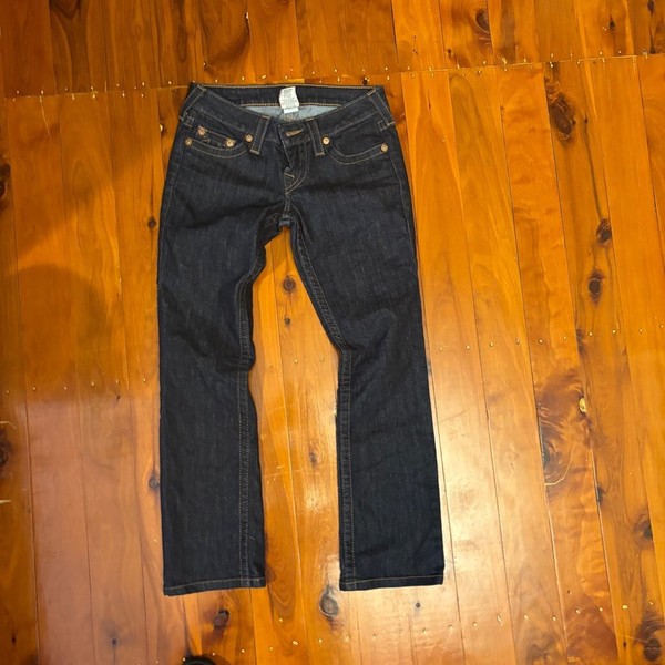 True Religion navy blue jeans with rhinestone horseshoe design on back pockets,