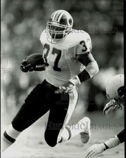 1989 Press Photo Washington Redskins Football Player Gerald Riggs Runs Ball