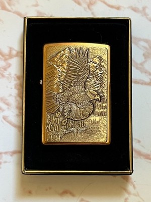 Zippo American Eagle in Flight. Brass, Never Fired. All Boxes And Paper Work.