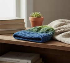 Handmade blue and yellow crochet beanie perfect for a casual winter season look