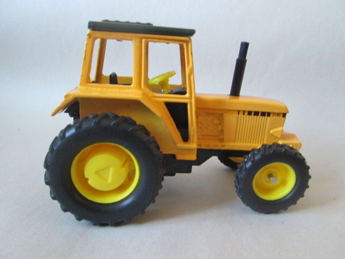 Diecast Yellow #8 Farm Tractor 3185 Friction Power Motor 1 Diecast Yellow #8 Farm Tractor 3185 Friction Power Motor 1