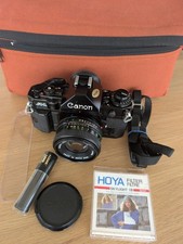 Canon A1 35mm SLR Film Camera + FD 50mm lens  + New Battery + case, EXC+++