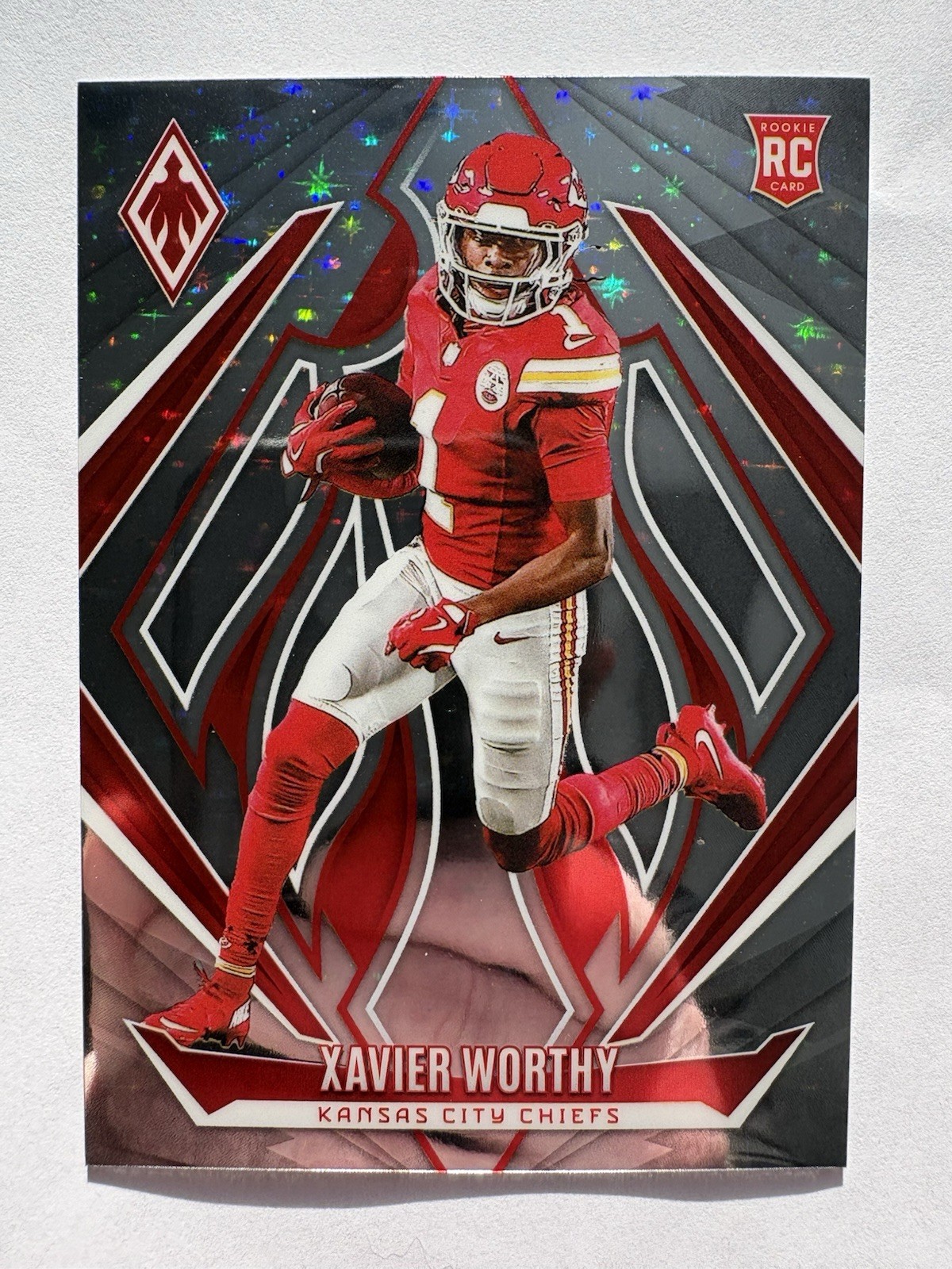 2024 Panini Phoenix - Rookies Xavier Worthy #250 Stars /180 (RC)