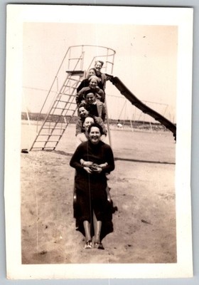 Vtg B&W Snapshot Group Of Happy Women Playing On Playground Slide Smiles 1930s