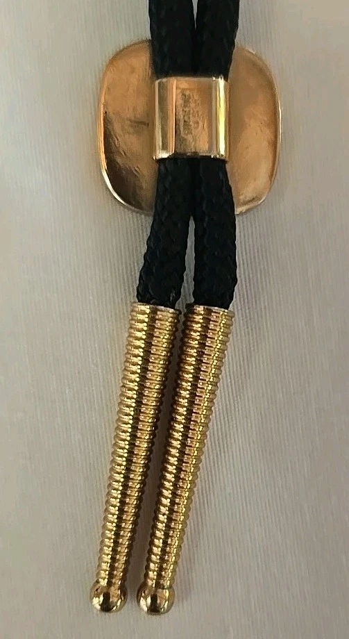 Corbata bolo tono latón HICKOK de colección elefante blanco sobre esmalte negro. SKU6 Foto 4 de 4