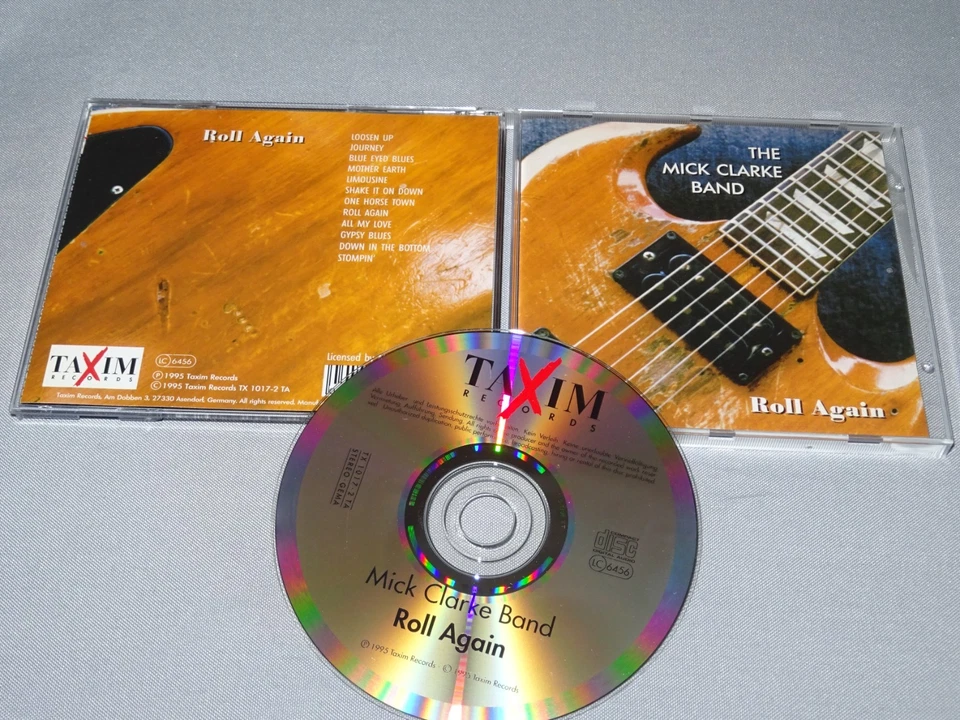 THE MICK CLARKE BAND - ROLL AGAIN / TAXIM-CD 1995 (CD MINT-) - Bild 1 von 1