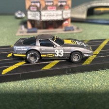 Tyco 440x2 gray Chevy Corvette 33 with running chassis    